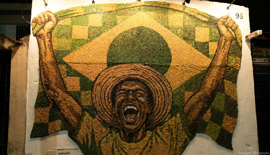 Yoki cria mural com grãos de milho em ação cultural em Heliópolis